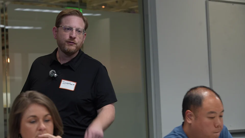 Jonathan Malkin moving between participants while teaching.